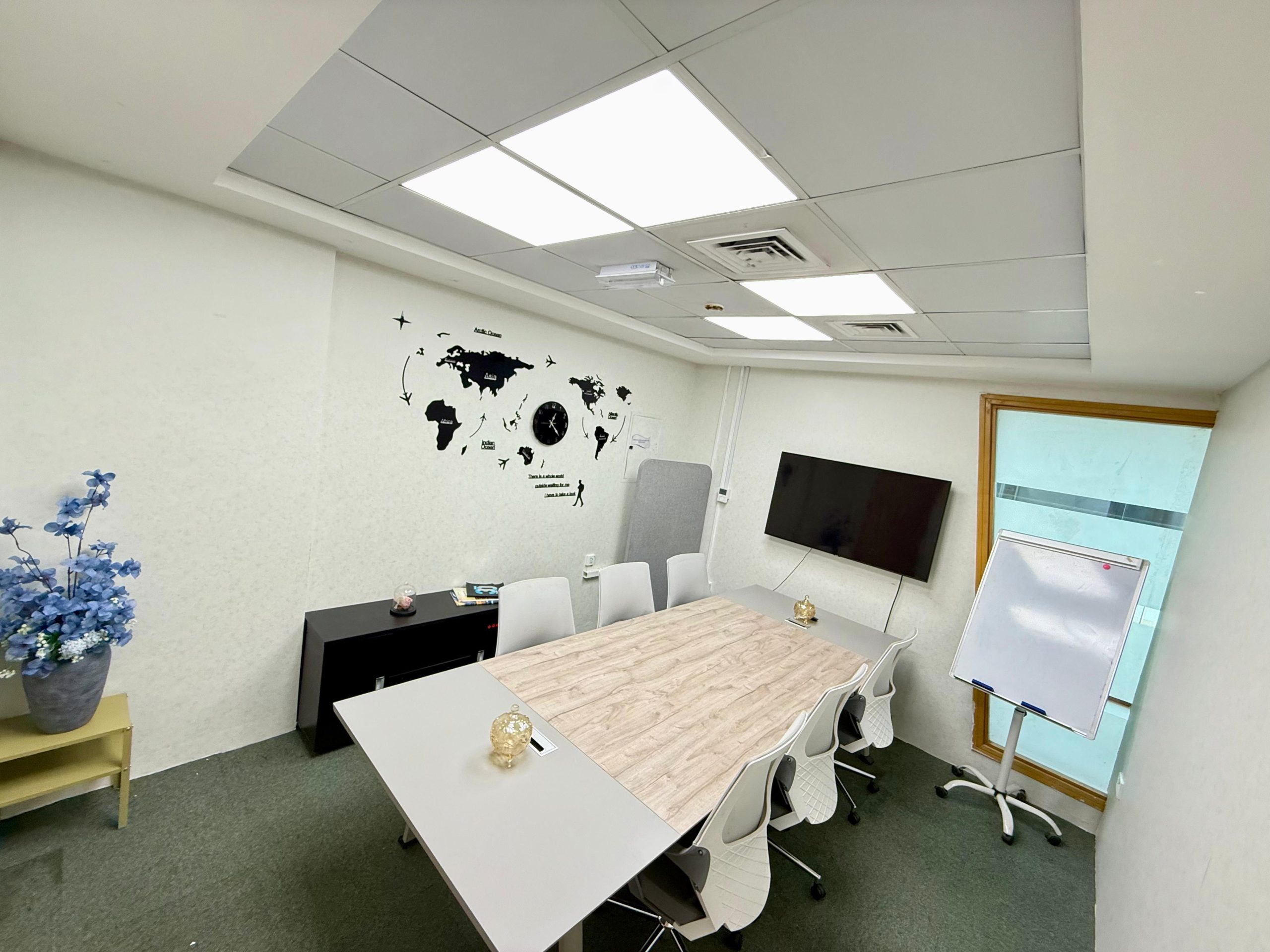 Meeting room with display and seating